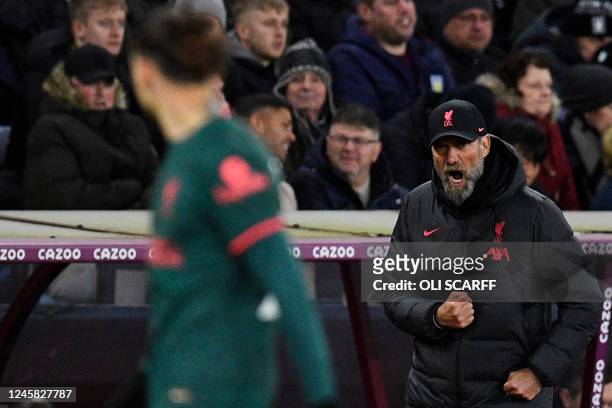 Liverpool's German manager Jurgen Klopp shouts instructions to Liverpool's Uruguayan striker Darwin Nunez during the English Premier League football...