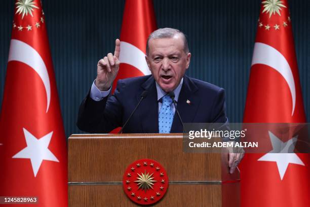 Turkish President Recep Tayyip Erdogan gestures as he addresses a statement after a cabinet meeting at the Presidential Complex in Ankara, on...