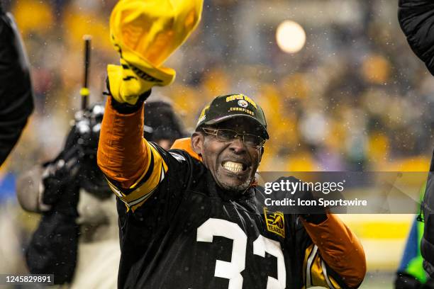 Former Pittsburgh Steelers running back Frenchy Fuqua waves a terrible towel during the national football league game between the Las Vegas Raiders...