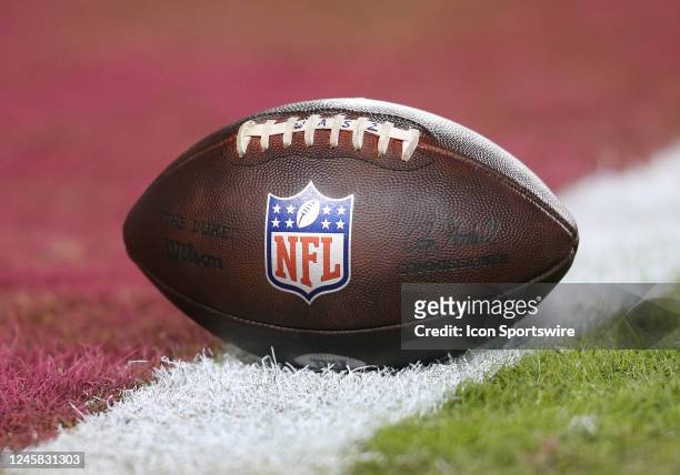 Football woth NFL logo resting on the field prior to the New York Giants game versus the Washington Commanders on December 18 at FedEx Field in...