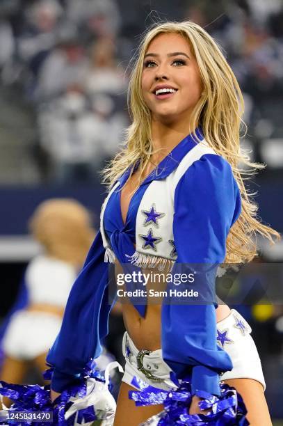 Dallas Cowboys Cheerleader performs during the first quarter of a game against the Philadelphia Eagles at AT&T Stadium on December 24, 2022 in...