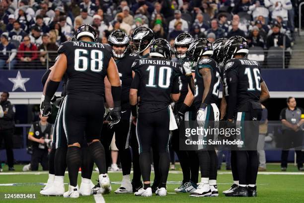 Gardner Minshew of the Philadelphia Eagles talks to his team in the huddle during the first quarter of a game against the Dallas Cowboys at AT&T...