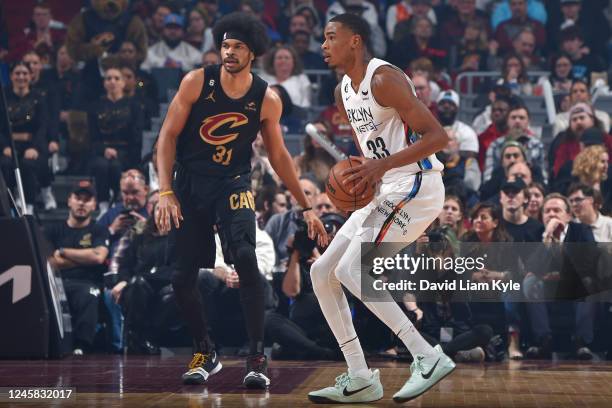 Nicolas Claxton of the Brooklyn Nets looks to pass the ball during the game against the Cleveland Cavaliers on December 26, 2022 at Rocket Mortgage...