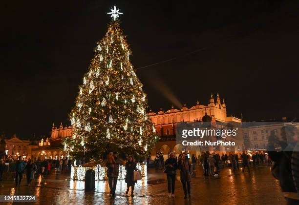 Christmas tree in Krakow's Market Square, seen on St Stephen's Day. On Monday, December 26 in Krakow, Lesser Poland Voivodeship, Poland.