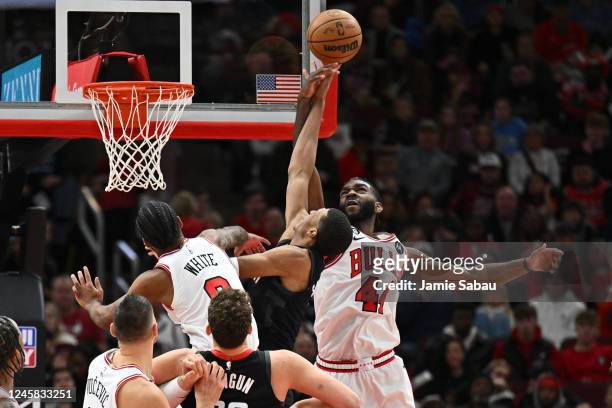 Patrick Williams of the Chicago Bulls blocks a shot by Jabari Smith Jr. #1 of the Houston Rockets in the second half on December 26, 2022 at United...