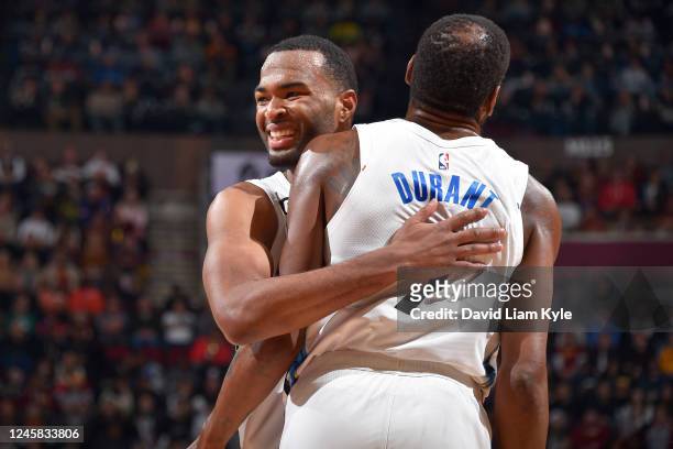 Warren hugs Kevin Durant of the Brooklyn Nets during the game against the Cleveland Cavaliers on December 26, 2022 at Rocket Mortgage FieldHouse in...