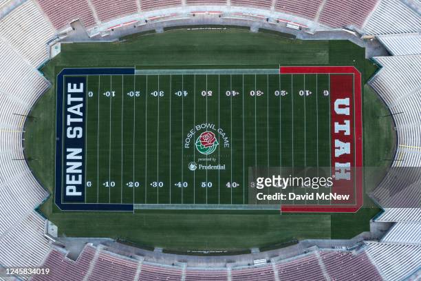 An aerial view of the Rose Bowl Game logo and the Utah and Penn State end zones on the field of the 100-year-old Rose Bowl Stadium prior to the Rose...