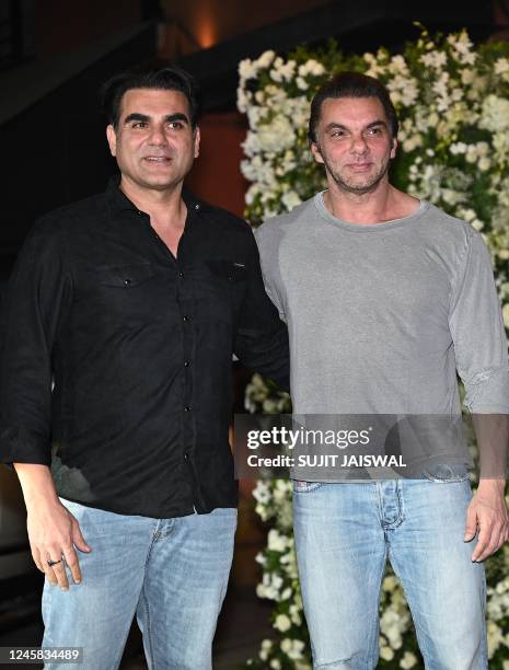 In this picture taken on December 26 Bollywood actors Arbaaz Khan and Sohail Khan attend actor Salman Khans birthday party in Mumbai.