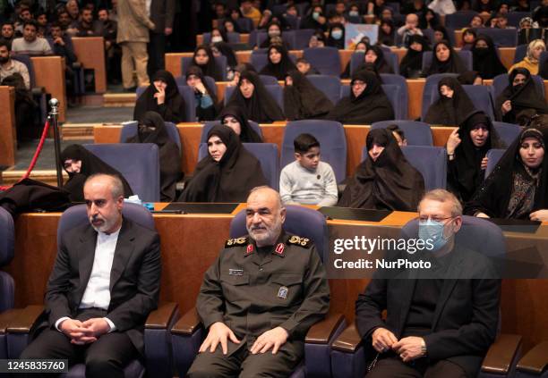 Commander in chief of Islamic Revolutionary Guard Corps , Major General Hossein Salami , sits next to former Parliament speaker, Ali Larijani , and...