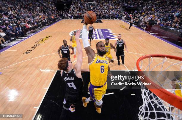 LeBron James of the Los Angeles Lakers goes up for the dunk during the game against the Sacramento Kings on December 21, 2022 at Golden 1 Center in...