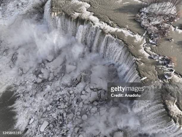 An aerial view of the partially frozen Niagara Falls, which is on the border with Canada, on December 27, 2022 in Niagara Falls, New York. A massive...