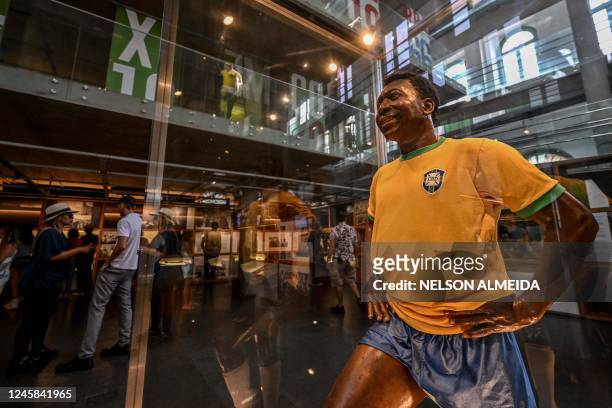 View of a wax figure of Brazil's football legend Edson Arantes do Nascimento 'Pele' at the Pele Museum, in Santos, Brazil, on December 27, 2022. -...