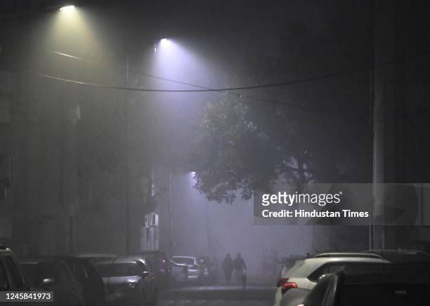 Delhiites brave the early morning heavy Fog and Winter Chill, at Dwarka on December 27, 2022 in New Delhi, India. The lowest minimum temperature in...
