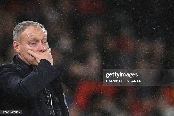 Nottingham Forest's Welsh manager Steve Cooper reacts during the English Premier League football match between Manchester United and Nottingham...