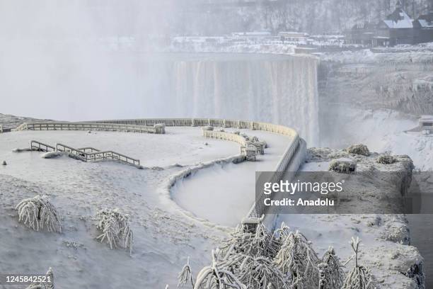 View of Niagara Falls as it is partially frozen due to extreme cold weather in the Northeast in New York, United States on December 27, 2022.
