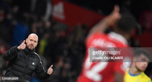 Manchester United's Dutch manager Erik ten Hag gestures as he reacts during the English Premier League football match between Manchester United and...