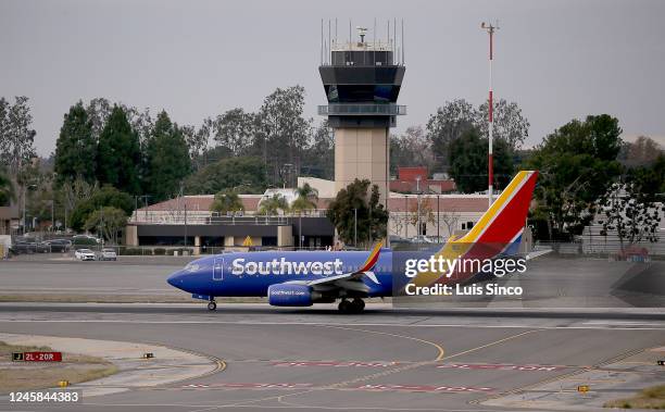 Southwest Airlines jetliner takes off from John Wayne Airport on Tuesday, Dec. 27 The budget carrier has canceled thousands of flights over the...