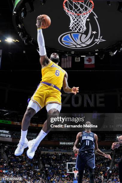 LeBron James of the Los Angeles Lakers shoots the ball against the Orlando Magic on December 27, 2022 at Amway Center in Orlando, Florida. NOTE TO...