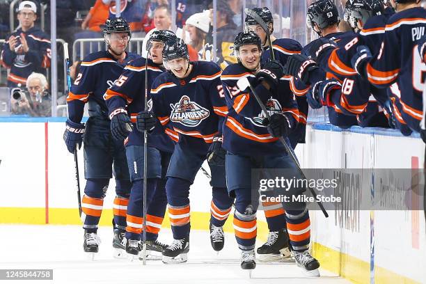 Mathew Barzal of the New York Islanders celebrates with teammates after scoring his second goal of the second period against the Pittsburgh Penguins...