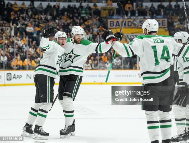 Roope Hintz celebrates his goal with Jani Hakanpää of the Dallas Stars against the Nashville Predators during an NHL game at Bridgestone Arena on...