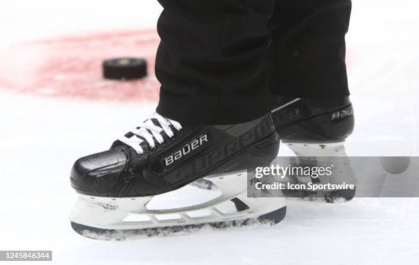 General view of a linesman's Bauer skates and the puck is shown during the NHL game between the Nashville Predators and Dallas Stars, held on...