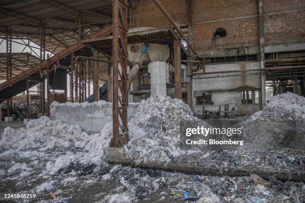 Piles of plastic and other waste following the pulping procedure at Genus Paper & Boards Ltd., paper mill in Muzaffarnagar District, Uttar Pradesh,...