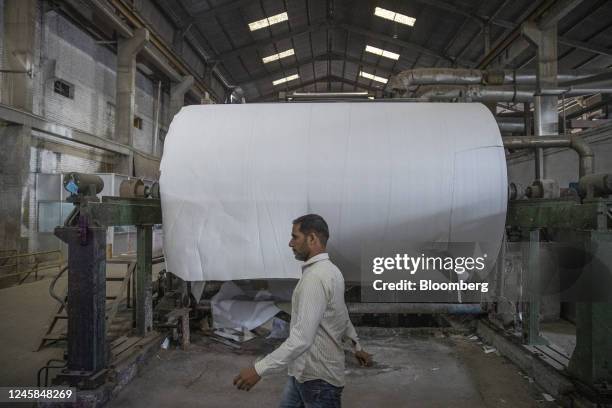 Roll of paper on a machine at Genus Paper & Boards Ltd., paper mill in Muzaffarnagar District, Uttar Pradesh, India, on Saturday, Nov. 19, 2022....