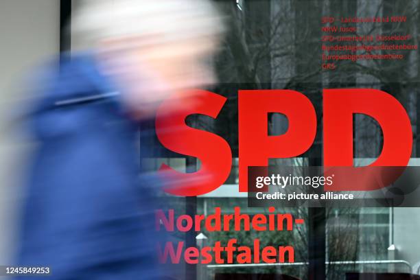 December 2022, North Rhine-Westphalia, Duesseldorf: A passerby walks past the headquarters of the SPD North Rhine-Westphalia. The major parties CDU...