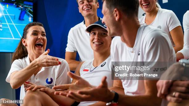 Agnieszka Radwanska of Poland, Iga Swiatek of Poland and Hubert Hurkacz of Poland during a video shoot on Media Day ahead of the United Cup at Pat...