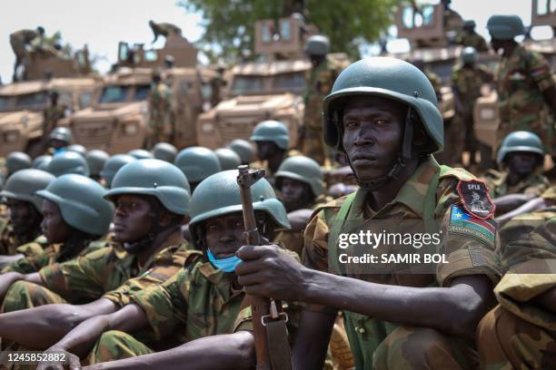 Soldiers of the South Sudan People's Defence Forces prepare to be deployed to the Democratic Republic of Congo after their departure ceremony at the...