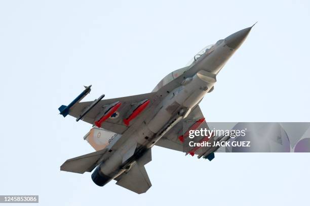 An Israeli Air Force F-16 Fighting Falcon fighter plane performs during a graduation ceremony of Israeli Air Force pilots, at the Hatzerim base in...