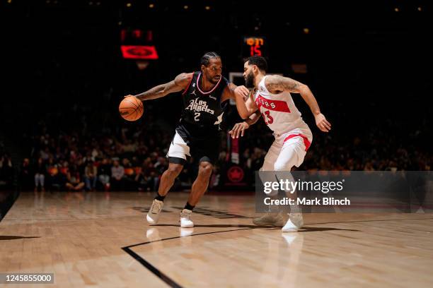 Kawhi Leonard of the LA Clippers drives to the basket against the Toronto Raptors on December 27, 2022 at the Scotiabank Arena in Toronto, Ontario,...