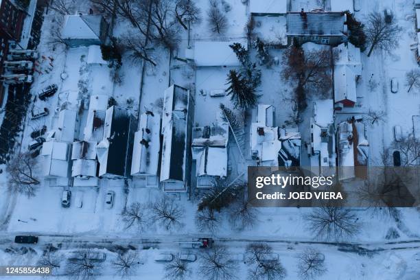 In this aerial photo, fallen trees on the photographer's home after the blizzard in Buffalo, New York, on December 28, 2022. - The monster storm that...