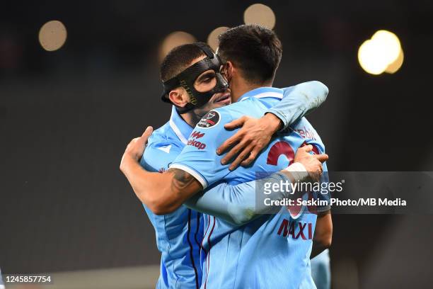 Marc Bartra of Trabzonspor celebrates after scoring the first goal of his team with Maxi Lopez during the Super Lig match between Fatih Karagumruk SK...