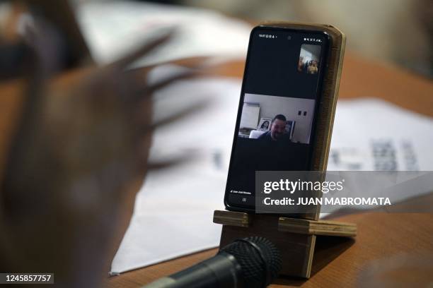 Juan Jose, the 132nd grandson, is seen during a video call with the president of Abuelas de Plaza de Mayo, Estela de Carlotto, during a press...