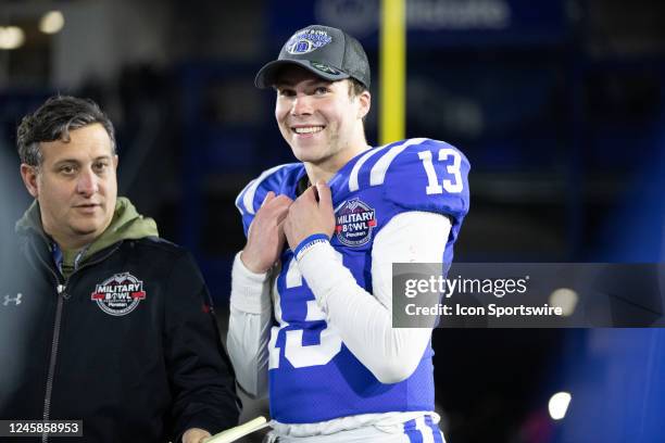 Duke Blue Devils quarterback Riley Leonard smiles after being named MVP of the Military Bowl between the UCF Knights and the Duke Blue Devils on...