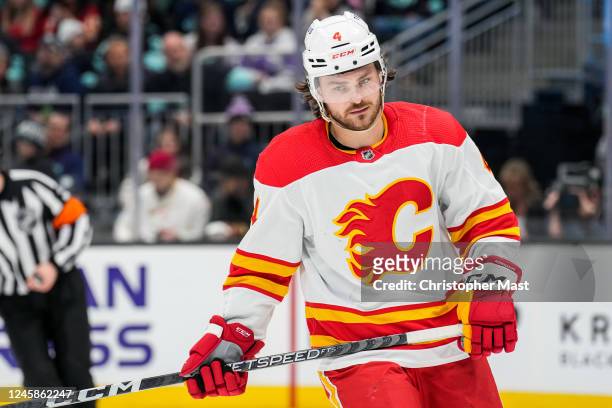 Rasmus Andersson of the Calgary Flames skates on the ice during the second period of a game against the Seattle Kraken at Climate Pledge Arena on...