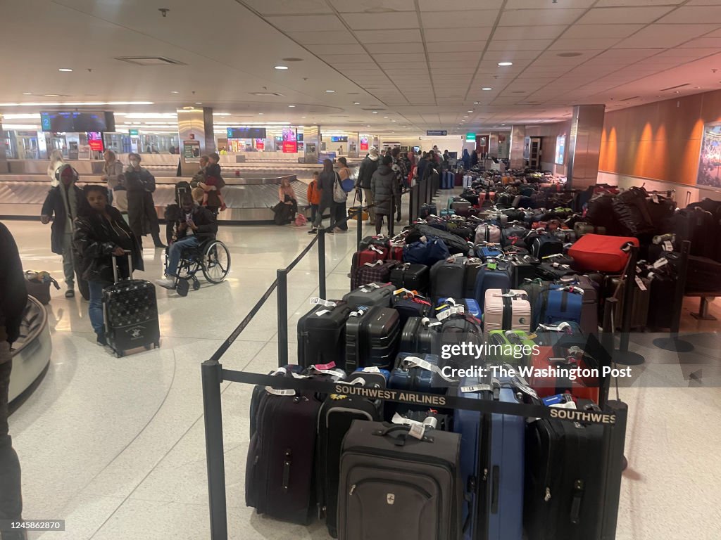 Flight Problems Masses of luggage backed up for Southwest Airline passengers at... News ...