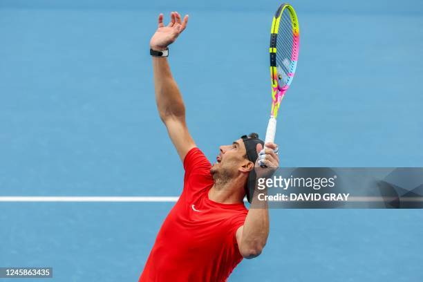 Spains Rafael Nadal serves during a training session at the United Cup tennis tournament in Sydney on December 29, 2022. - -- IMAGE RESTRICTED TO...