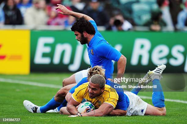 Digby Ioane of the Wallabies scores their third try during the IRB 2011 Rugby World Cup Pool C match between Australia and Italy at North Harbour...