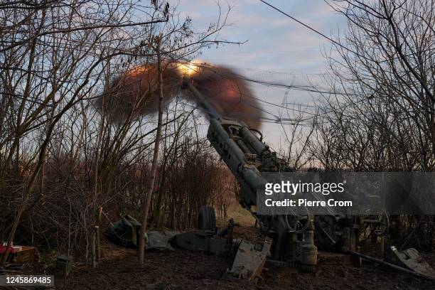 Soldiers of the Ukrainian 55th artillery brigade operate on the frontline with a US made Howitzer M777 cannon amid artillery fights on December 29,...