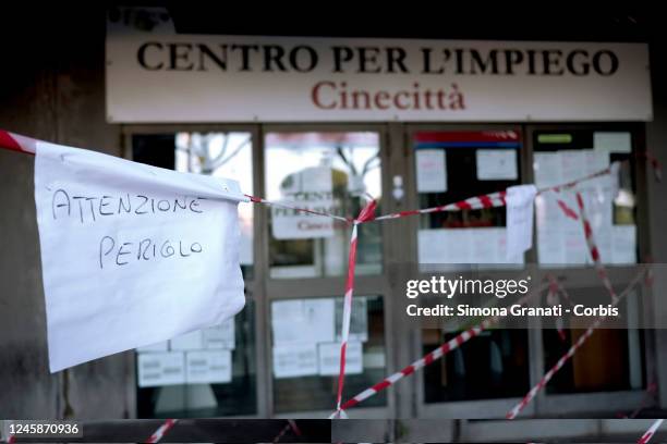 The taped-off main entrance of the Cinecittà Employment Center with a caution danger sign, on December 29, 2022 in Rome, Italy. The Employment...