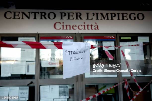 The taped-off main entrance of the Cinecittà Employment Center with a caution danger sign, on December 29, 2022 in Rome, Italy. The Employment...