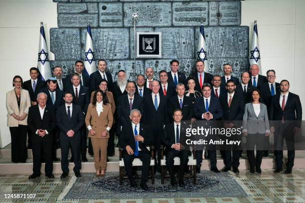 Israeli Prime Minister Benjamin Netanyahu, Israeli President Isaac Herzug and members of the new Israeli government pose for a traditional photo at...