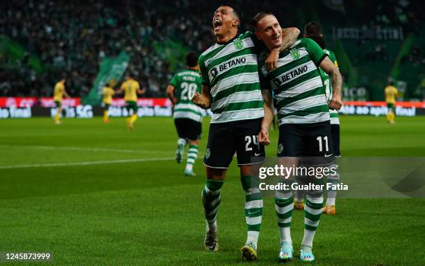 Pedro Porro of Sporting CP celebrates with teammate Nuno Santos of Sporting CP after scoring a goal during the Liga Bwin match between Sporting CP...