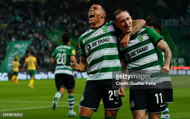 Pedro Porro of Sporting CP celebrates with teammate Nuno Santos of Sporting CP after scoring a goal during the Liga Bwin match between Sporting CP...