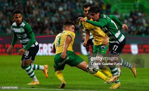 Francisco Trincao of Sporting CP with Nuno Lima of FC Pacos de Ferreira in action during the Liga Bwin match between Sporting CP and Pacos de...