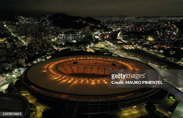 Maracana stadium is illuminated with a golden light in honour of Brazilian football legend Pele, in Rio de Janeiro, Brazil on December 29 on the day...