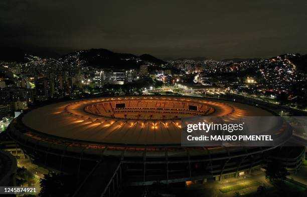 Maracana stadium is illuminated with a golden light in honour of Brazilian football legend Pele, in Rio de Janeiro, Brazil on December 29 on the day...