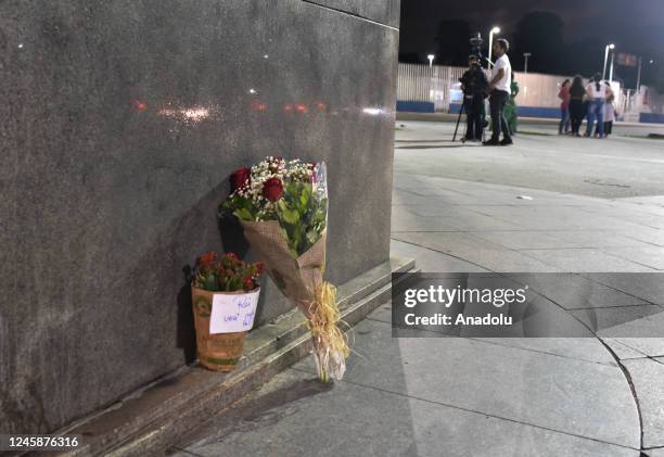 Fans lay flowers at Pele Statue in Maracana Stadium, Rio De Janeiro, Brazil on December 29, 2022. Brazilian Football legend Pele lost his fight to...